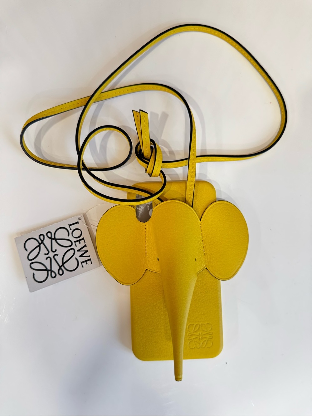 Loewe Leather yellow elephant Iphone case with strap.